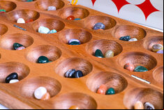 Rombol Wooden Hus Bao Game